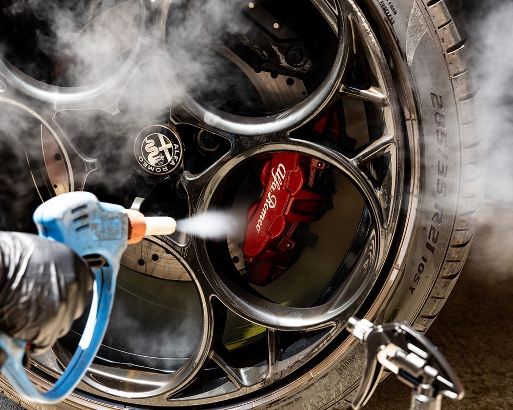 Performance wheel being steam cleaned.